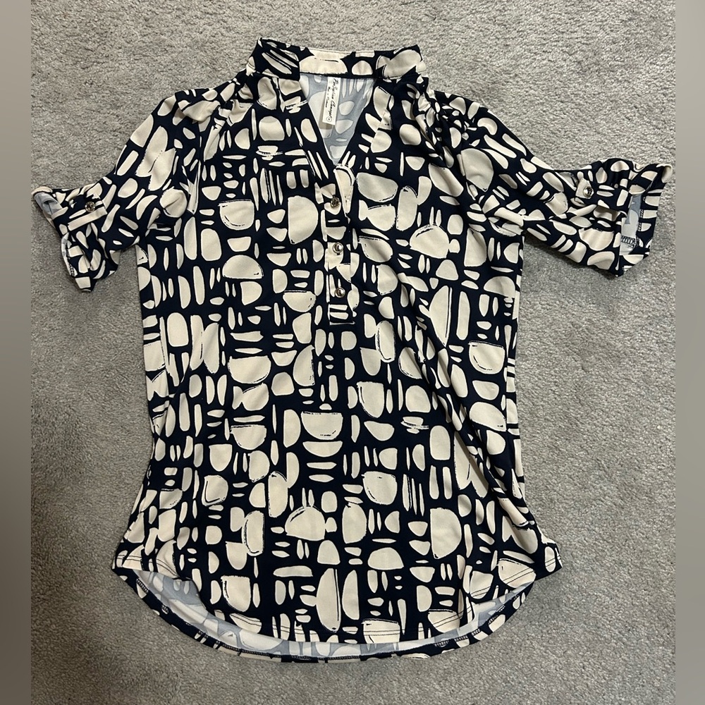 Small printed navy and tan dressy shirt. Never worn.